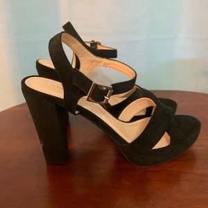 Open toed black heels